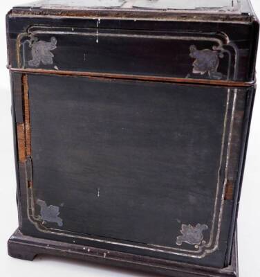 An early 19thC ebonised and metal tea caddy, of rectangular form, with swing handle, set with white metal panels with elaborate lock escutcheon and GR patent locks, on bracket feet, c1800, 34cm W. (AF) - 5