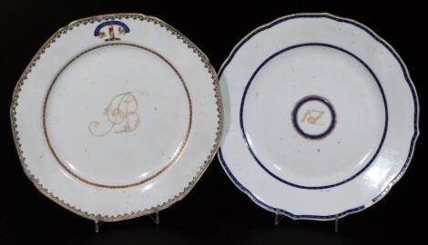 An 18thC Chinese porcelain armorial plate, of octagonal form, polychrome decorated with The Heart Is All crest and initialled to the centre, with an outer geometric banding, predominately in blue, orange and green, unmarked, 23cm W and another. (AF)