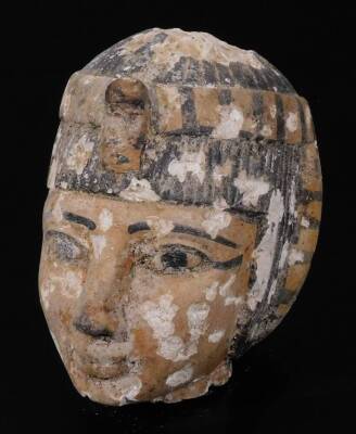 An Egyptian stone figure head, of a lady in elaborate head dress, 12cm H.