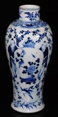 A 19thC Chinese Qing period porcelain baluster vase, decorated with figures holding an enlarged vase surrounded by prunus, birds and flowers, on circular foot, four character mark beneath, 30cm H. - 3