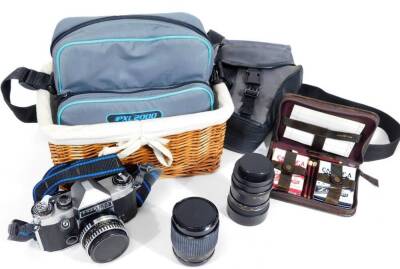 Various cameras and related equipment, a Praktica Super TL camera, 17cm W, lens, other carrying cases, cameras, etc. (a quantity)