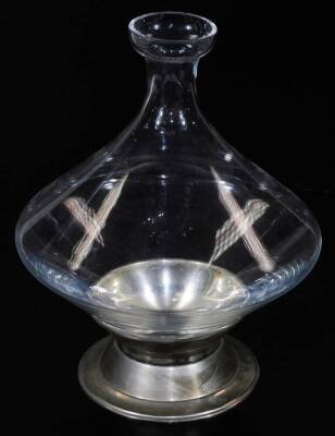 A glass vase decanter, in the manner of Baccarat, with a swirl decoration on a plated stand, 27cm H. (unmarked)