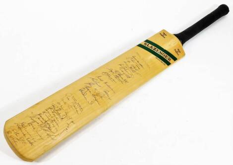 A Slazenger cricket bat, c1971, signed by various teams, New Zealand to include Hadlee, West Indians to include Fredericks, Lloyd, Yorkshire, Lancashire and England, Greig, etc. various other signatures, 84cm H.