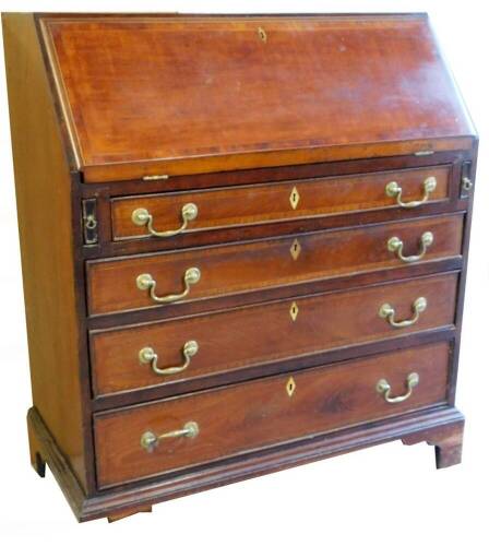 A George III mahogany bureau, the fall with diamond escutcheon and wide crossbanding, revealing a fitted interior above rectangular loafers and four long drawers, each with swan neck handles, on bracket feet, 103cm H, 88cm W, 48cm D.