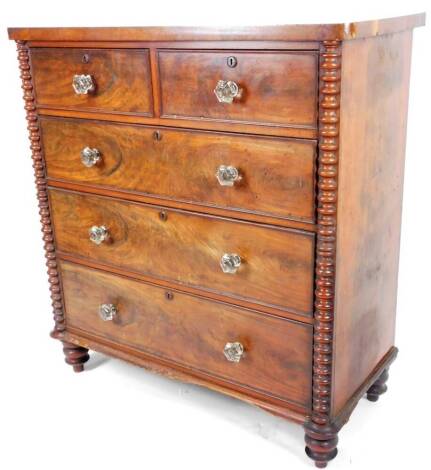 A Victorian mahogany chest, of two short and three long cock beaded drawers flanked by quarter columns, on double bun feet, 119cm H, 109cm W, 50cm D.