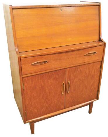 A G-Plan type bureau, with fall above single drawer and double cupboard, on tapering legs, 109cm H, 75cm W, 41cm D.
