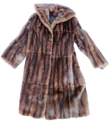 A 20thC ladies fur coat, quarter length with silk type lining, size unknown.