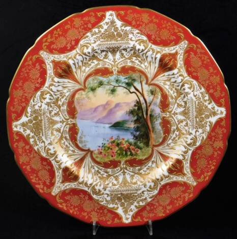 A Royal Doulton handpainted cabinet plate, decorated to the centre with a lakeland scene, with an outer floral border on an orange and cream ground, no. 293 and printed Doulton marks beneath, 27cm W.