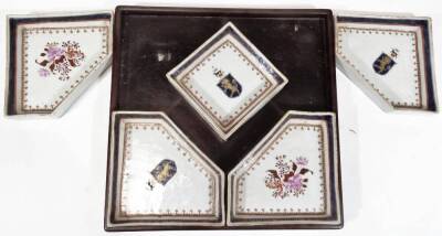 A Chinese export porcelain sweet meat dish serving set, with square central dish surrounded by four other shaped examples, with gilt highlights, two set with horse surmounted lion shields, the other two with a bouquet of flowers, predominately in pink and - 2