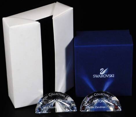 A boxed Swarovski crystal Antonio paperweight, 6cm W and another Isadora. (2)