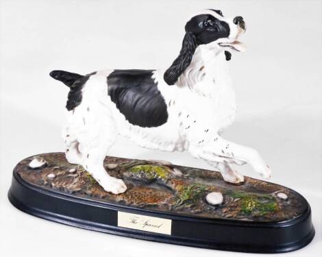 A Beswick/Royal Doulton figure, The Spaniel, on removable base, printed marks beneath, 24cm H.