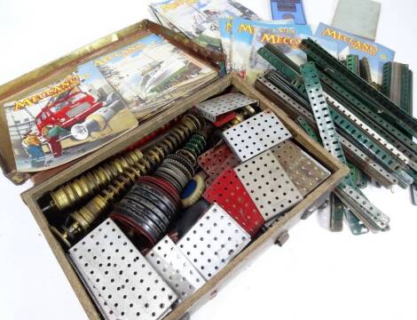 Various Meccano and related ephemera, Meccano magazine, various pieces, lengths of green metal, oblong sections, 32cm W, models for outfit 403 and 3A, etc. (a quantity)