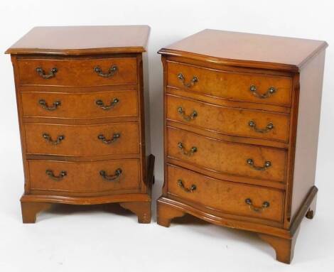 A pair of 20thC bird's eye maple and mahogany finish serpentine chest, of four drawers, on bracket feet, 73cm H, 51cm W, 41cm D.
