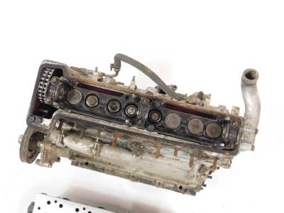 A complete Coventry Climax engine, suitable for rebuilding to FWA spec, together with a modified machined cylinder head, complete silver engine. - 4