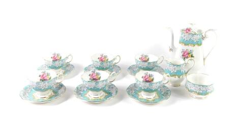 A Royal Albert porcelain part coffee service, decorated in the Enchantment pattern, comprising coffee pot, cream jug, sugar bowl, six cups and saucers.