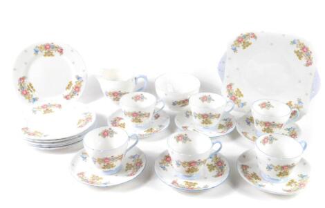 A Shelley early 20thC porcelain part tea service, Richmond shape, decorated with floral sprays, pattern no 2323A, printed and painted marks, comprising bread plate, cream jug, sugar bowl, six cups and saucers and tea plates.