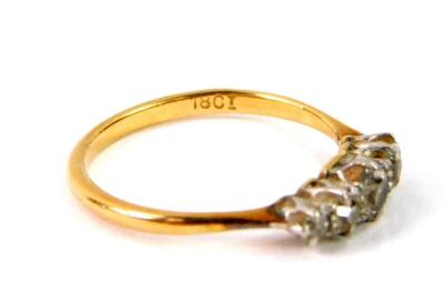 An 18ct gold and diamond five stone ring, approx 0.4cts, size N, 2.3g. - 2