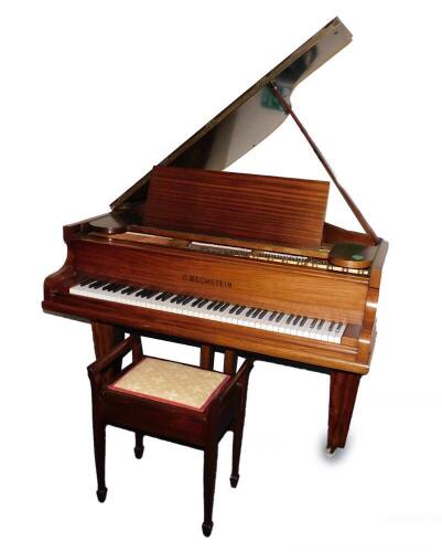 A Bechstein 6ft 6" model grand piano c1904, mahogany cased, on square tapering legs, on brass castors, frame stamped underside No 23030 Model A, Serial No 68590, together with a mahogany piano stool, and a receipt of purchase and restoration summary.