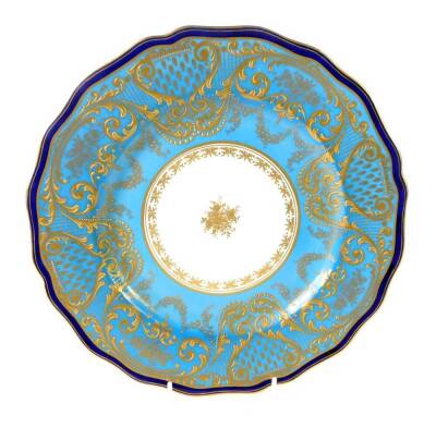 A Royal Doulton late 19thC porcelain cabinet plate, retailed by Burley & Company, Chicago., gilt decorated and jewelled with floral swags and foliate scrolls, against a turquoise ground, within a cobalt blue border, RA3484, printed and painted marks, 26cm