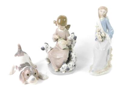 A Lladro porcelain figure of a girl, modelled seated holding a bunch of Cana Lilies, further figure group, modelled as a girl with a honey pot and three puppies, and a Lladro figure of a puppy. (3)