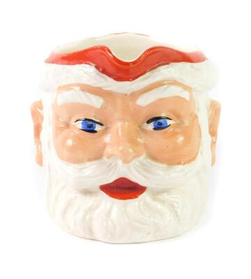 A 1950's pottery character jug modelled as Father Christmas, for Birds Custard, printed and painted marks, 10.5cm H. - 2