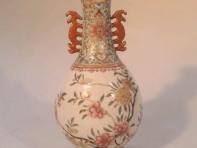 A 20thC Chinese porcelain Famille Rose vase