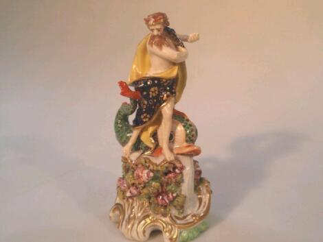 A Derby porcelain figure of Neptune with a dolphin