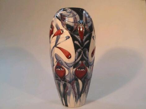 A Moorcroft pottery ovoid vase designed by Emma Bossons