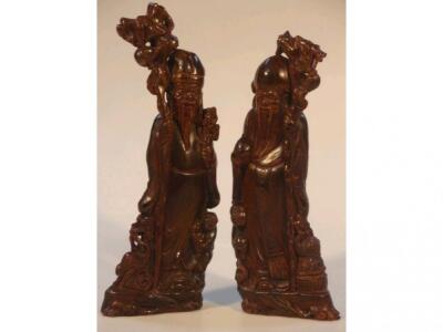 A pair of Chinese carved horn figures