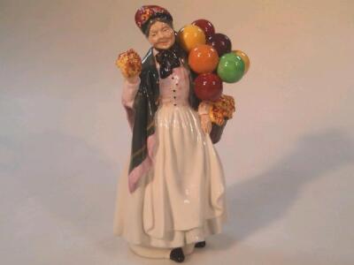 A Royal Doulton figure 'Biddy Penny Farthing'