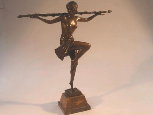 An Art Deco style bronze figure of a dancer