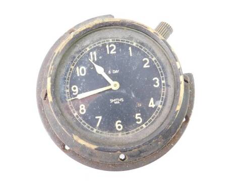 A WWII Smiths aeroplane eight day clock.