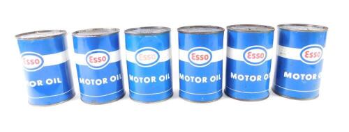 Six Esso Motor Oil tins, containing contents.