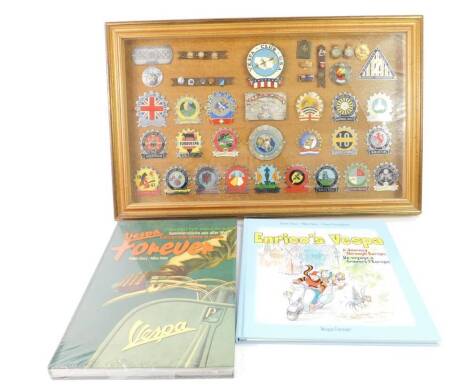 A framed collection of Vespa Club plaques and badges, mainly mid 20thC, and two Robin Davey Vespa books.