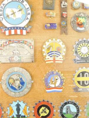 A framed collection of Vespa Club plaques and badges, mainly mid 20thC, and two Robin Davey Vespa books. - 3