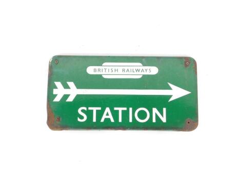 A British Railways Station green enamel sign, with white arrow and lettering, 27cm H, 53cm W.