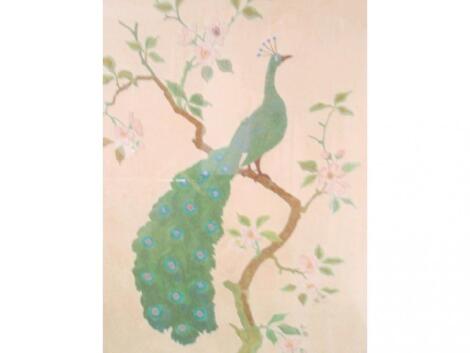 An early 20thC silk needlework panel of a peacock on a flowering branch