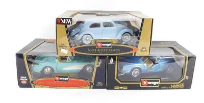 Three Burago die cast vintage motor cars, scale 1:18, comprising Chevrolet Corvette 1957 Special Edition, Volkswagen Beetle 1955, Gold Collection, and a Lancia Aurelia B24 Spider 1955, all boxed.