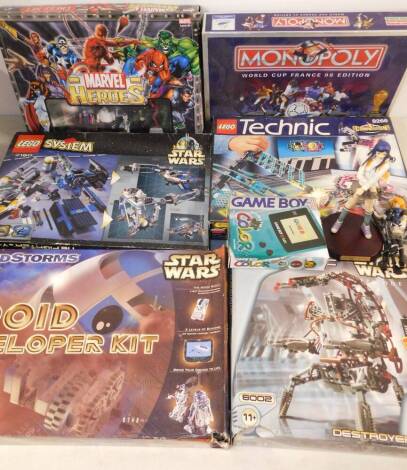 A LEGO Star Wars Minestorms Droid Developer Kit, 9748, Ty-Fighter and Y-Wing 7150, Technic Destroyer Droid, 8002, and a Technic Competition Set, 8266, all boxed, together with a Monopoly World Cup 1988 Edition, Nintendo Gameboy, Marvel Heroes chess set, 