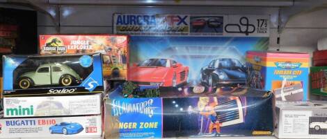 A Hornby Gladiator's Danger Zone game, boxed, Aurora AFX Ghost Racer, Micro Machines Toolbox City, Airfix and other cars and die cast vehicles, most boxed. (qty)