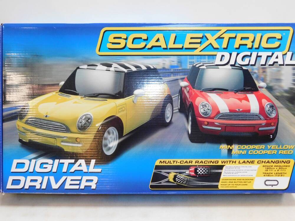A Scalextric Digital Driver Set, Mini Cooper yellow and red, with