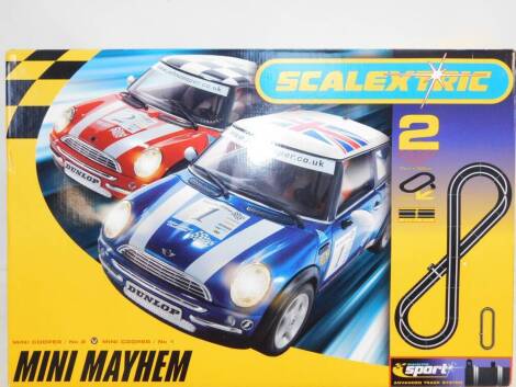 A Scalextric Mini Mayhem Set 2, with Mini Cooper numbers 1 and 2, advanced track system, boxed.