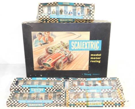 A Tri-ang Mini Models Scalextric Model Motor Racing set, together with vendors and spectators, track spectators, track officials and pit crew, mechanics and drivers, and mechanics and spectators, all boxed. (6)