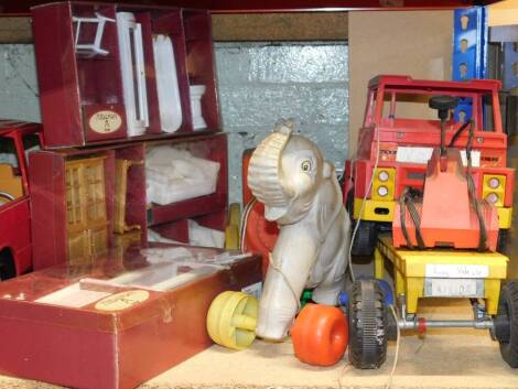 Alberon dolls house furniture, boxed, plastic pull along elephant and locomotive and a Topper Toyland lorry and trailer, remote control. (6)