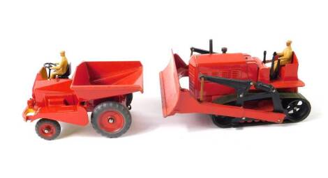 A Dinky Supertoys Blaw Knox bulldozer, red body with driver and crawler tracks, No 561, together with a dumper truck, red body with driver, No 562, both boxed.