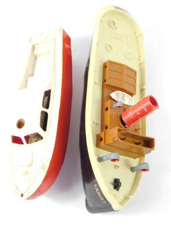 A Penguin clockwork powered model of a tugboat 'Annie', Series 4, with key, boxed, together with a Penguin hi-speed cruiser, key lacking, boxed. (2)