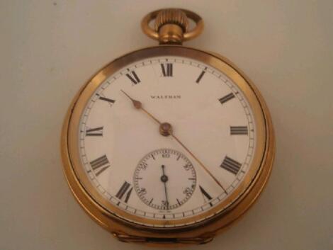 A Waltham gold plated open face bezel wind pocket watch