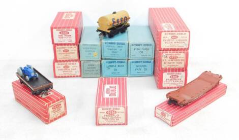 Hornby OO gauge vans and wagons, including a petrol tank wagon, fish van, horse box, Caustic Liquor bogie wagon, and a passenger fruit van, all boxed. (15)