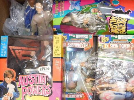 Four Austin Powers figures, comprising Dr Evil in silver suit with Mini-Me, Dr Evil and Mini-Me with the Mini Mobile, Headliners XL Dr Evil, and Austin Powers, all boxed, and further figures, unboxed. (qty)