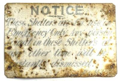 An enamel sign relating to Ruston and Hornsby Limited, stating NOTICE, these shelters are for use in emergency only, any person found in these shelters at any other time will be instantly dismissed. This sign relates to the Second World War period and the